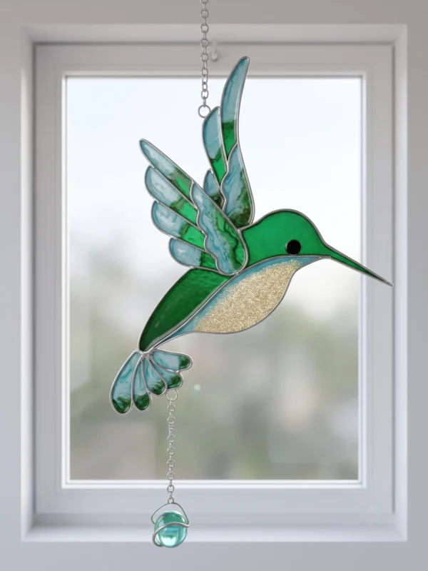 Eisvogel türkis im Fenster