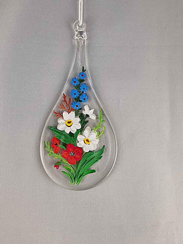 Glastropfen mit Blumen