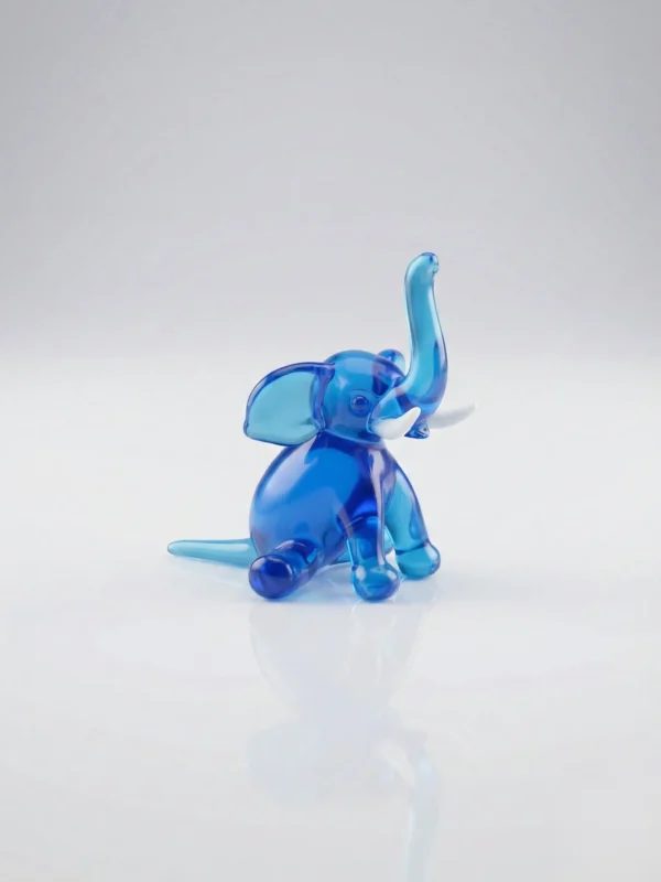 Elefant sitzend türkis